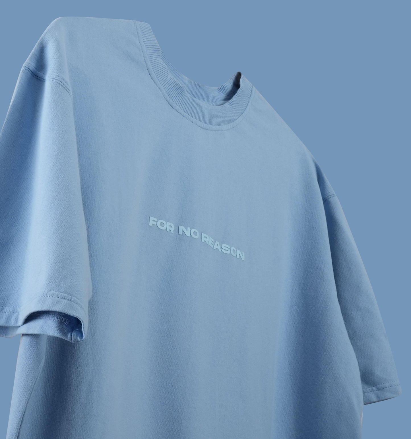 FNOR Basics sky blue oversized t-shirt with bold “For No Reason” text on soft premium fabric from the Basics collection.