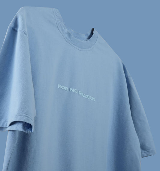 FNOR Basics sky blue oversized t-shirt with bold “For No Reason” text on soft premium fabric from the Basics collection.