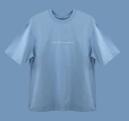 Front view of FNOR Basics sky blue oversized t-shirt featuring minimalist “For No Reason” print, part of the Basics collection.