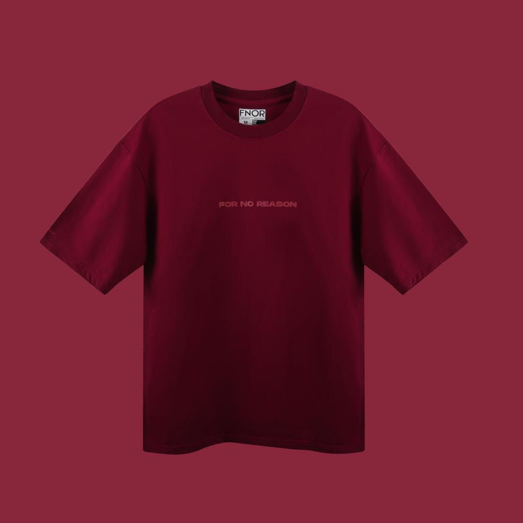 Full view of burgundy FNOR oversized t-shirt with minimalist logo.