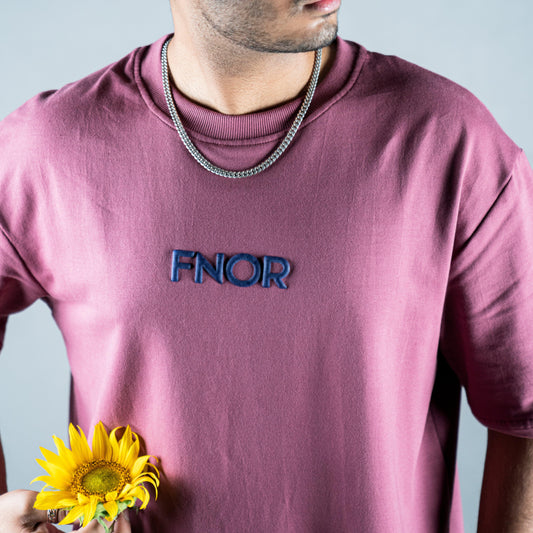 Front view of WHIMSICAL WINGS MAUVE T-SHIRT with FNOR logo in puff on the chest in blue.